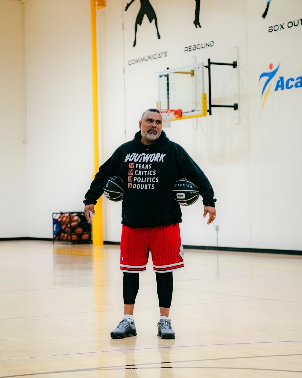 Olin Simplis running a session with two basketballs in The Dojo